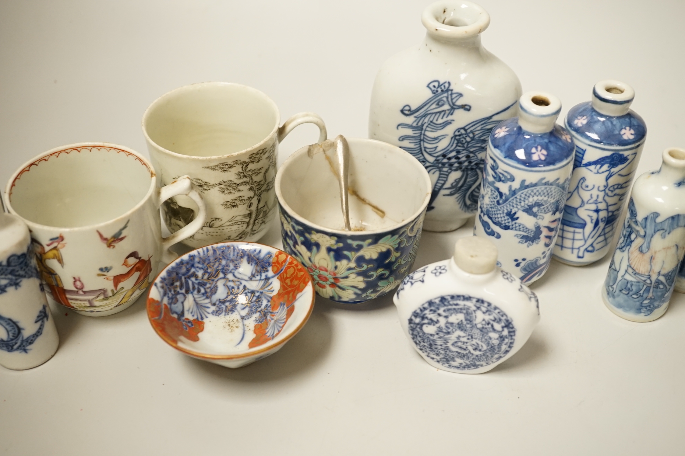 A group of Chinese porcelain snuff bottles and other export Chinese porcelain, an English porcelain cup, etc